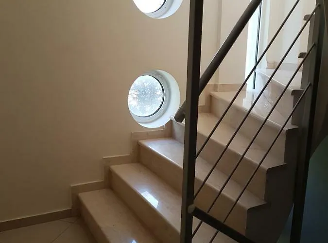 Christina's Beachside Апартаменты